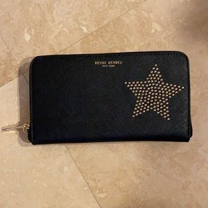 Henri Bendel zip around continental wallet